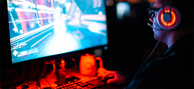 A man playing games on his computer