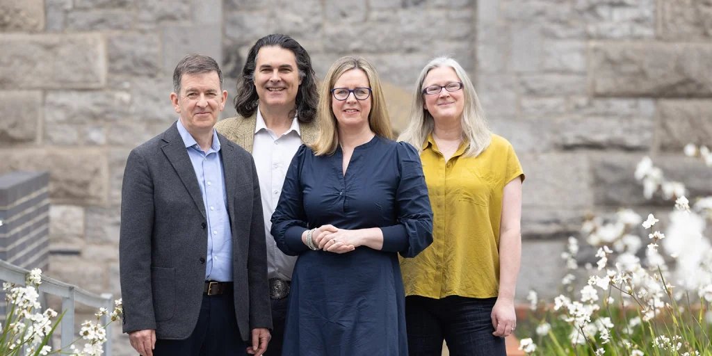 A group photo showing Diotima founder and Chief Product Officer Siobhan Ryan; Diotima CEO Jonathan Dempsey; Head of the School of Education at Trinity College Dublin Dr Ann Devitt and Learnovate Impact, Licensing & Commercialisation Manager Tom Pollock.